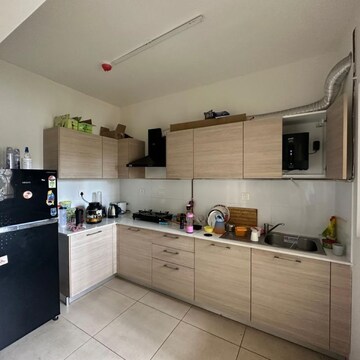 Kitchen in 2 BHK Apartment at Bhartiya Nikoo Homes, Kannur – for Rent