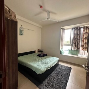 Bedroom in 2 BHK Apartment at Bhartiya Nikoo Homes, Kannur – for Rent