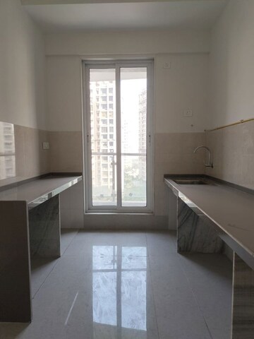 Kitchen in 3 BHK Apartment at Rosa Manhattan, Ghodbunder Road – for Rent