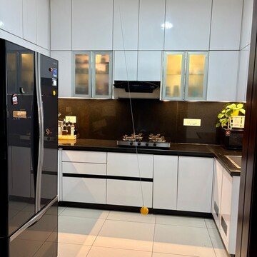 Kitchen in 2 BHK Apartment at Puravankara Palm Beach, Essel Gardens – for Rent