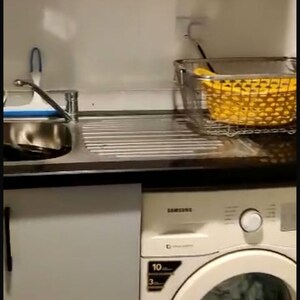 Kitchen in 2 BHK Apartment at Puravankara Palm Beach, Essel Gardens – for Rent