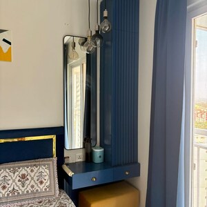 Living Room in 2 BHK Apartment at Puravankara Palm Beach, Essel Gardens – for Rent