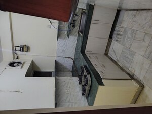 Kitchen in 2 BHK Apartment at Windsor and Nova Society, Ahinsa Khand 2 – for Sale