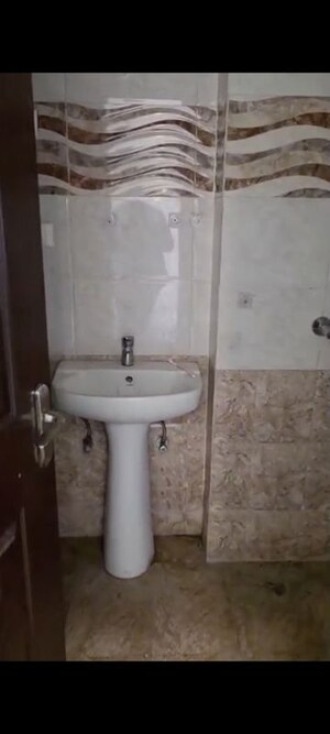 Bathroom in 3.5 BHK Apartment at Sector 16c Greater Noida – for Rent