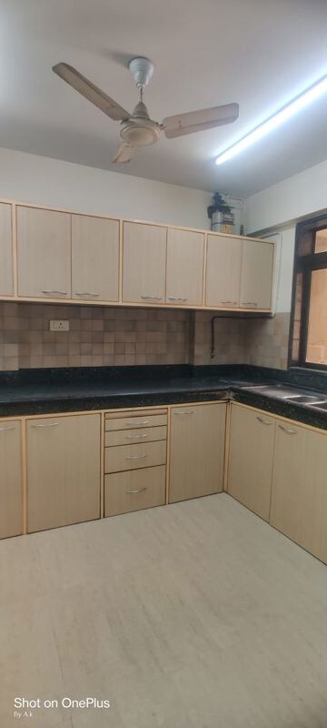 Kitchen in 2 BHK Apartment at Lake Side Cooperative Housing Society, Chandivali – for Rent