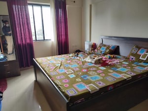 Bedroom in 2 BHK Apartment at Gera Emerald City, Kharadi – for Rent