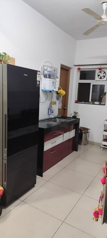 Kitchen in 2 BHK Apartment at The Chatterjee The Crown Greens, Hinjewadi – for Rent