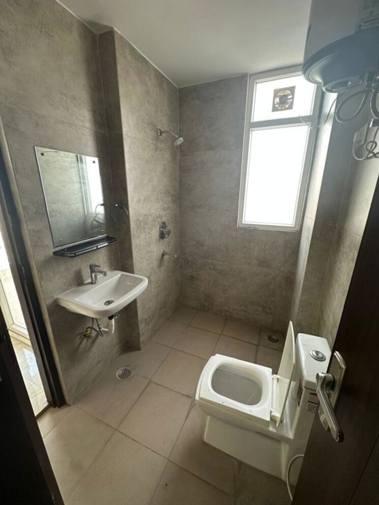 Bathroom, tulip-yellow 3 Bedroom 1704 Sq.Ft. Apartment In Sector 69 Gurgaon 9905288