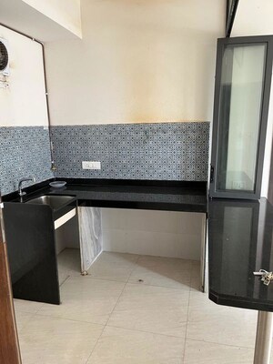 Kitchen in 2 BHK Apartment at Lodha Crown Quality Homes, Majiwada – for Rent
