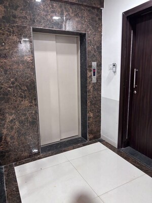 Building Lobby in 2 BHK Apartment at Divine Dazzle, Rahatani – for Rent