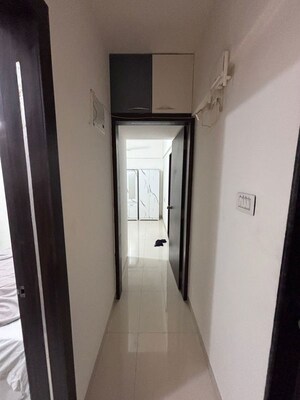 Building Lobby in 2 BHK Apartment at Divine Dazzle, Rahatani – for Rent