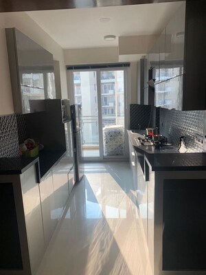 Kitchen in 2 BHK Apartment at Suncity Avenue 76, Sector 76 – for Rent