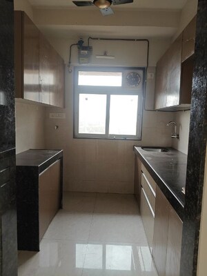 Kitchen in 1 BHK Apartment at Veena Senterio, Chembur – for Sale