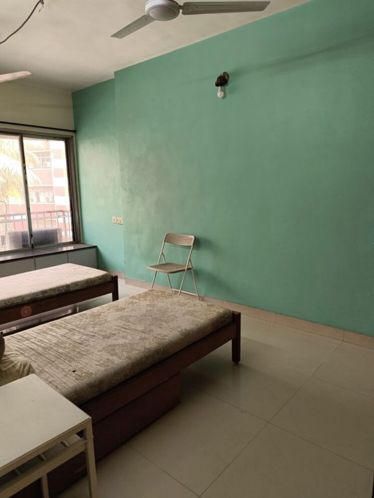 Living Room, kaustubh-usha-colony-chs 2.5 Bedroom 900 Sq.Ft. Apartment In Malad West Mumbai 9905678