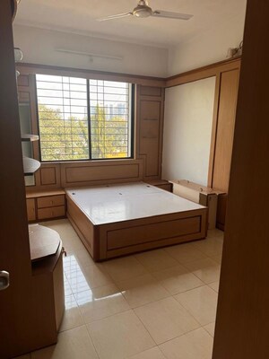 Bedroom in 2 BHK Apartment at Wadgaon Sheri – for Rent
