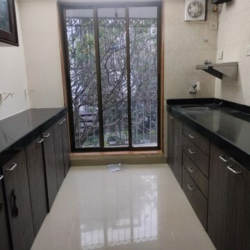 Kitchen in 2 BHK Apartment at Juhu Natraj CHS, Vile Parle West – for Rent
