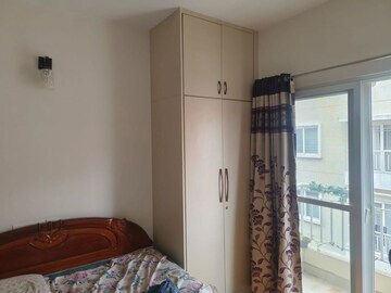 Bedroom in 2 BHK Apartment at Brigade Bricklane, Jakkuru – for Rent