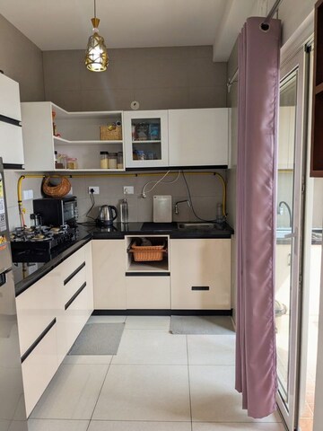 Kitchen in 2 BHK Apartment at Sobha Dream Gardens, Thanisandra Main Road – for Rent