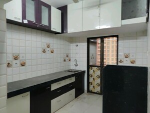 Kitchen in 1 BHK Apartment at Realtech Heights, Golani Naka – for Rent