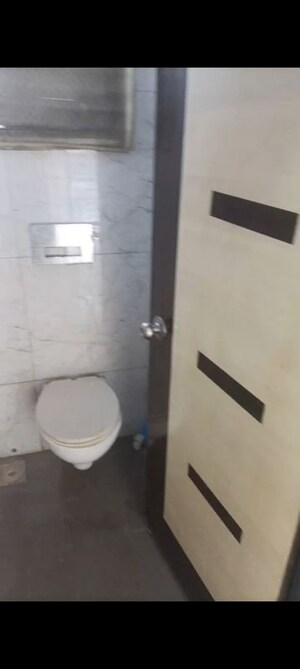 Bathroom in 1 BHK Apartment at RNA NG Canary, Mira Road – for Rent