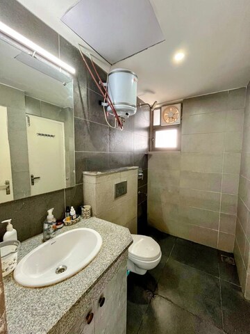 Bathroom in 3.5 BHK Apartment at Paras Dews, Sector 106 – for Rent