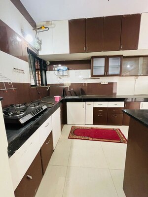 Kitchen in 2 BHK Apartment at Kumar Periwinkle, Kharadi – for Rent