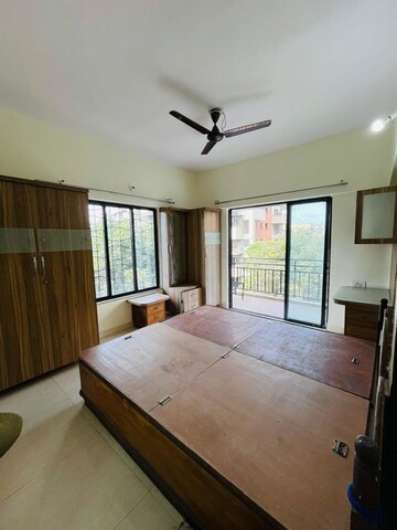 Bedroom in 2 BHK Apartment at Kumar Periwinkle, Kharadi – for Rent