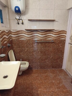Bathroom in 3 BHK Apartment at Arun Vihar Sector 37, Sector 37 – for Rent