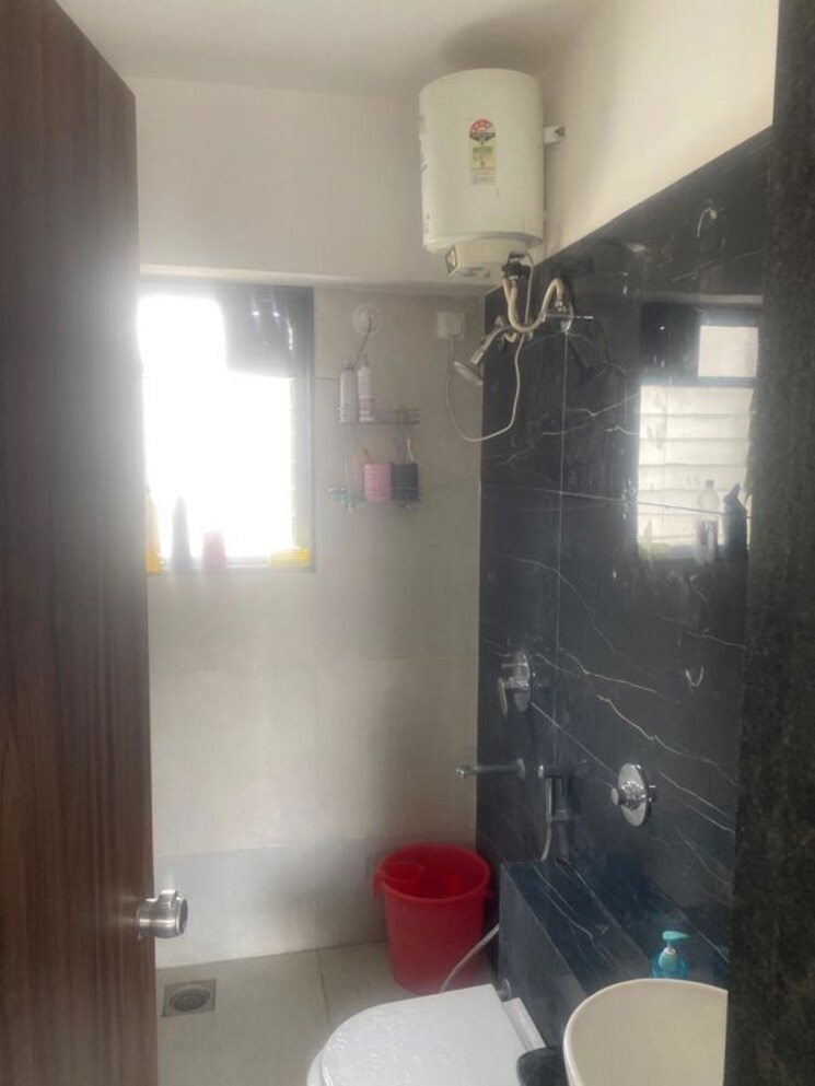 Bathroom, choice-goodwill-breeza 2 Bedroom 1100 Sq.Ft. Apartment In Dhanori Pune 9906399