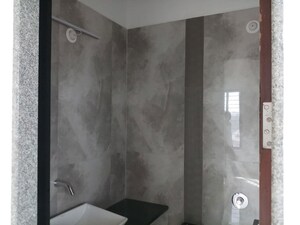 Bathroom in 3 BHK Apartment at MICL Aaradhya One Earth, Ghatkopar East – for Sale