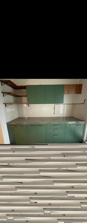 Kitchen in 2 BHK Apartment at Piramal Vaikunth, Balkum Pada – for Rent