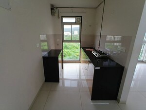 Kitchen in 1 BHK Apartment at Godrej Tranquil, Kandivali East – for Rent