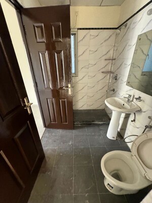 Bathroom in 3 BHK Apartment at Amrapali Heartbeat City, Sector 107 – for Rent