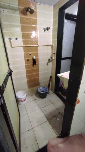 Bathroom in 1 RK Apartment at Rose Garden CHS, Mira Road – for Rent