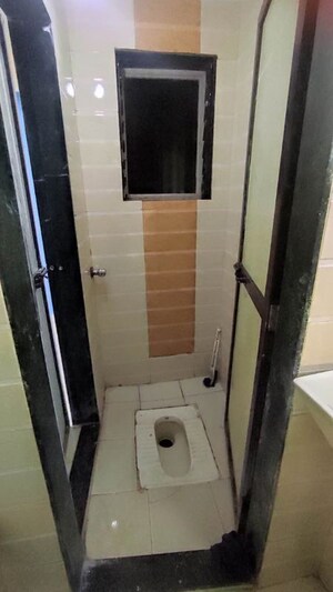 Bathroom in 1 RK Apartment at Rose Garden CHS, Mira Road – for Rent