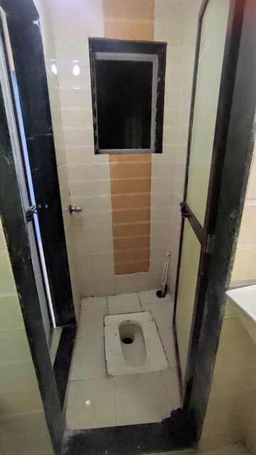 Bathroom in 1 RK Apartment at Rose Garden CHS, Mira Road – for Rent