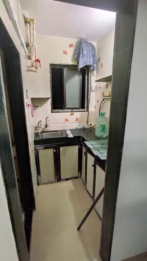 Kitchen in 1 RK Apartment at Rose Garden CHS, Mira Road – for Rent