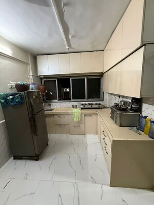 Kitchen in 2 BHK Apartment at Vijay Enclave, Waghbil – for Rent