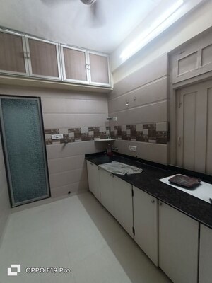Kitchen in 1 BHK Apartment at Matunga Vashudha CHS, Matunga – for Rent