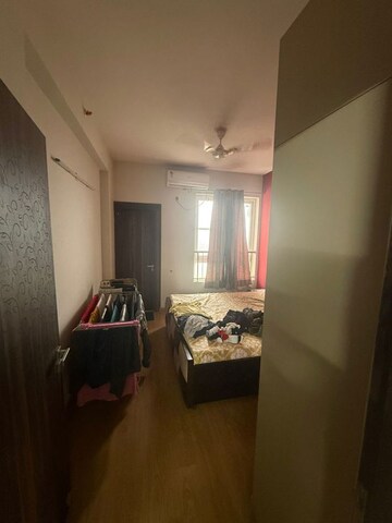 Bedroom in 3.5 BHK Apartment at Emaar Palm Gardens, Sector 83 – for Rent