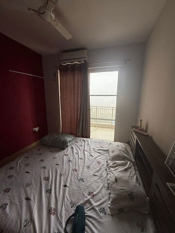 Bedroom in 3.5 BHK Apartment at Emaar Palm Gardens, Sector 83 – for Rent