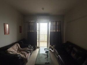 Living Room in 3.5 BHK Apartment at Emaar Palm Gardens, Sector 83 – for Rent