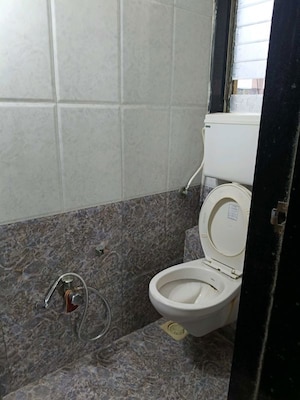 Bathroom in 1 BHK Apartment at Anchor Park, Vasai East – for Rent