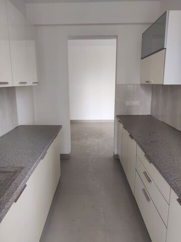 Kitchen in 3.5 BHK Apartment at Emaar Imperial Gardens, Sector 102 – for Sale