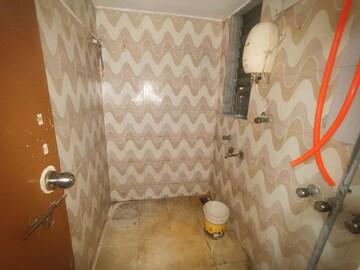 Bathroom in 1 BHK Apartment at Aries CHS, Vasai East – for Rent