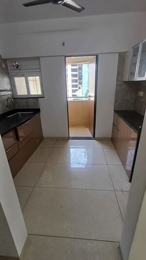 Kitchen in 2 BHK Apartment at Anand Eastwoods, Viman Nagar – for Rent