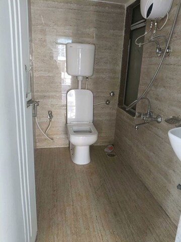 Bathroom in 1 BHK Apartment at Shellproof Gladiolus Tower, Vasai East – for Rent