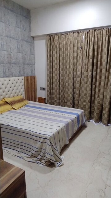 Bedroom in 3 BHK Apartment at Omkar Alta Monte, Malad East – for Rent