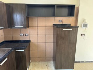 Kitchen in 4 BHK Apartment at Amrapali Heartbeat City, Sector 107 – for Rent