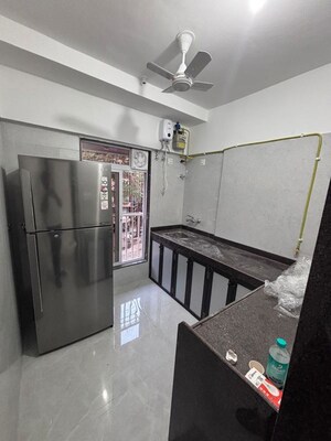 Kitchen in 2 BHK Apartment at Jayakunj Apartment CHSL, Borivali West – for Rent